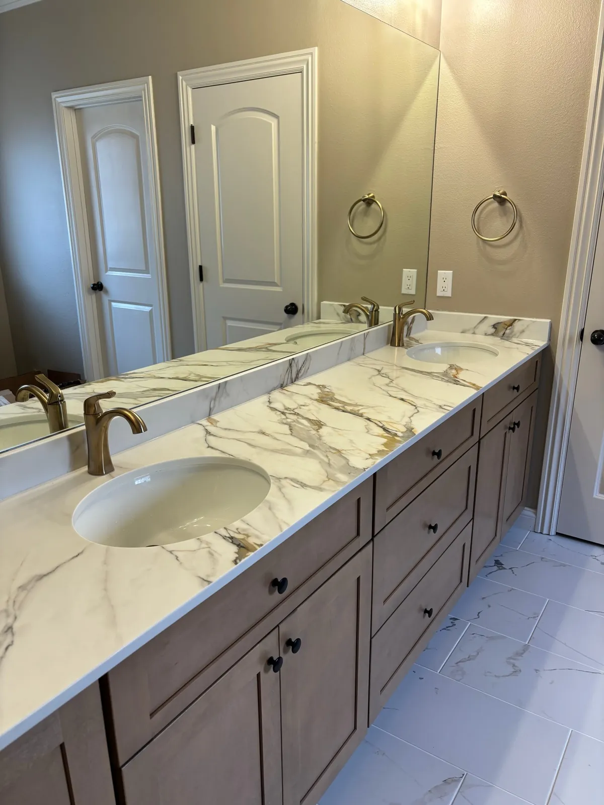 Double sink marble vanity with mirror wall