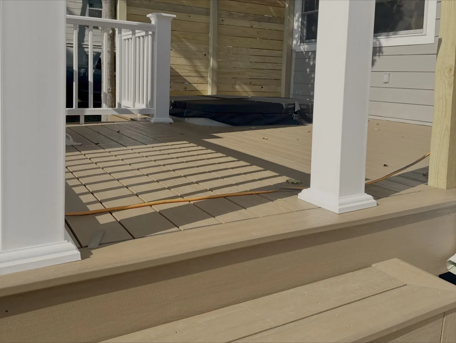 Composite deck patio for a hot tub
