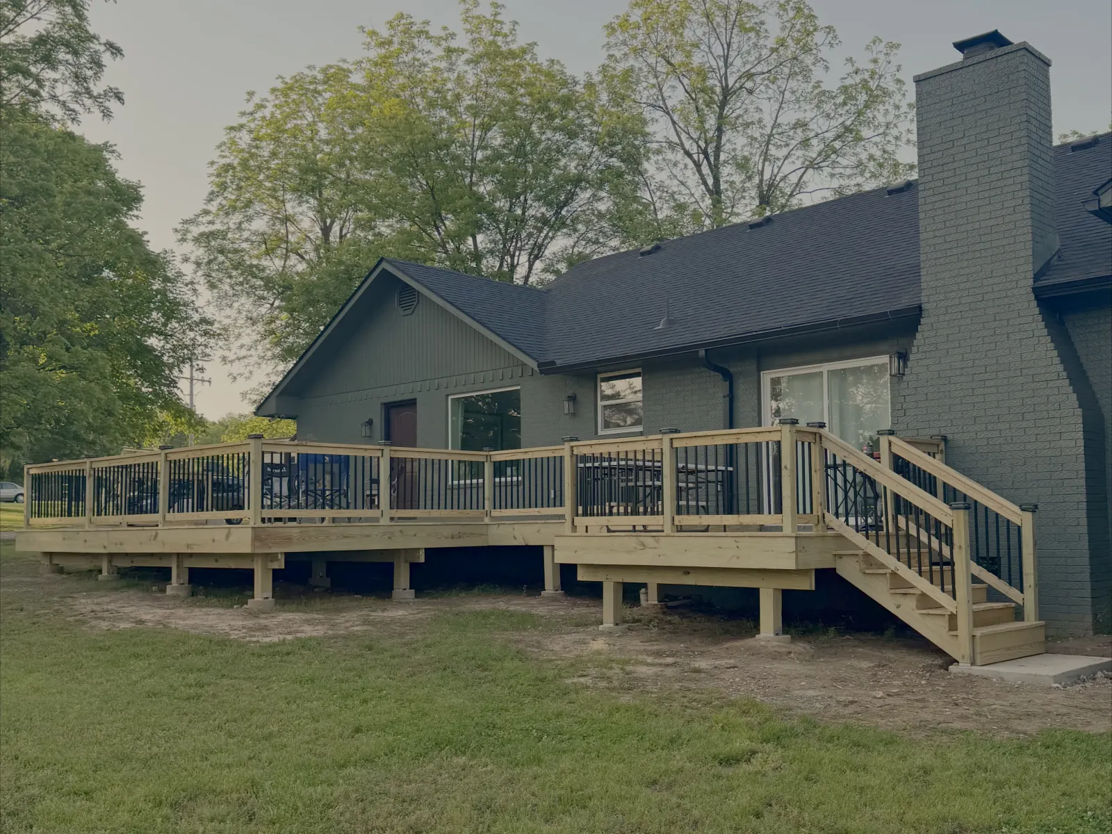 Wood deck and stairs on back patio