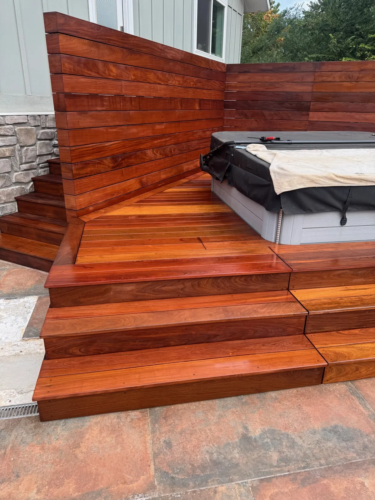 Finished ipe deck with hot tub in evening light