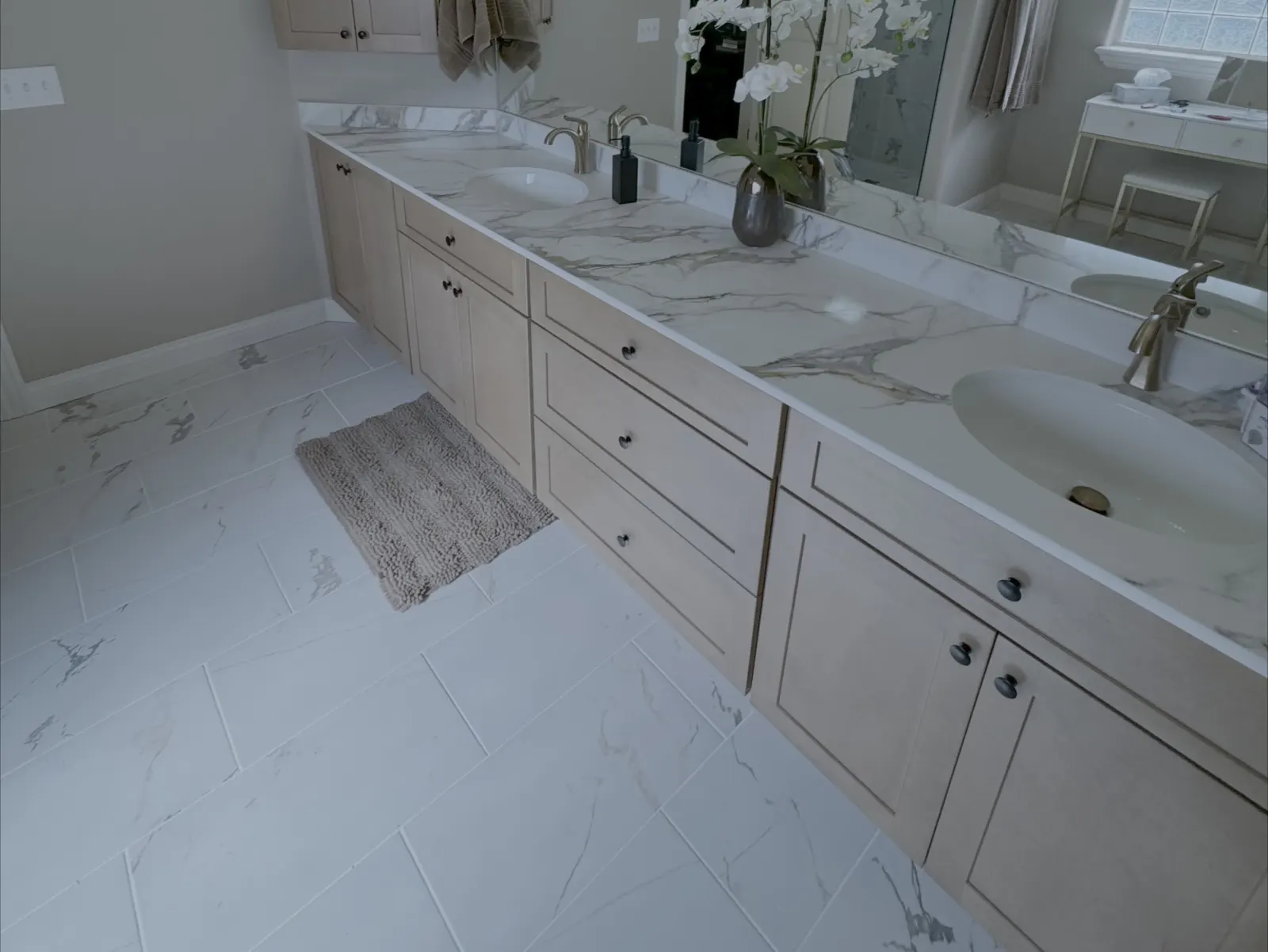 Bathroom remodel with tile floor and vanity