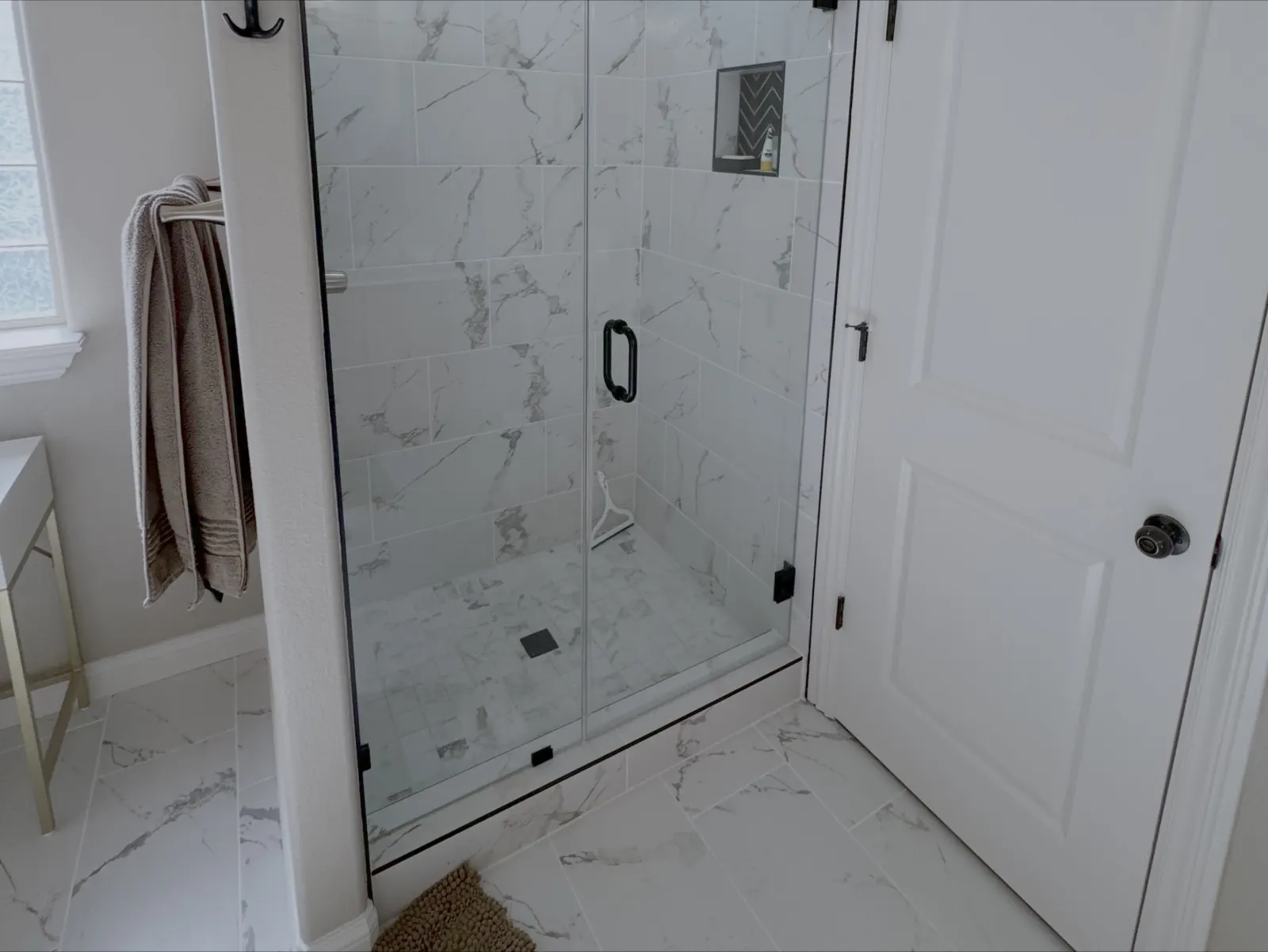 Custom shower remodel with glass enclosure